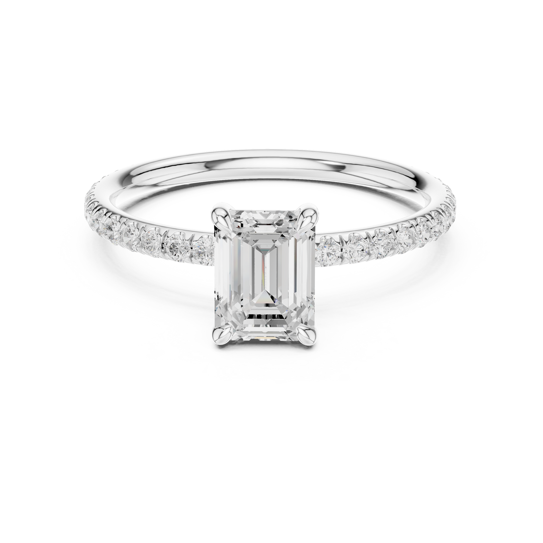 Diamond ring with emerald-cut center stone on a white background